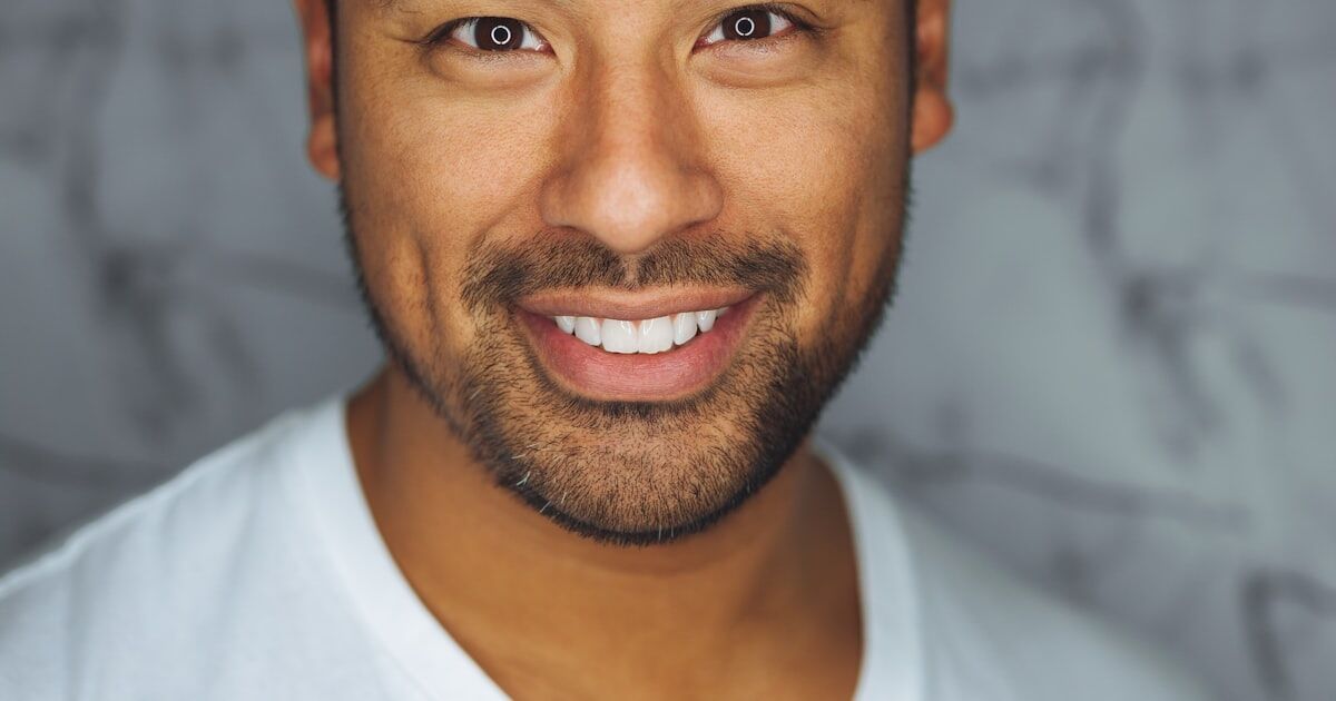 A concerned family member noticing untouched pills in a weekly medication organizer